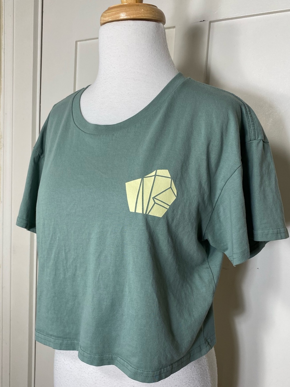 AS Colour Ostara Crux Fest Sage Green Mint Cropped Graphic Short Sleeve Tee M
